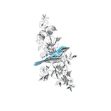 Tatouage éphémère, tatouage temporaire d'un oiseau bleu sur des fleurs