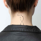Tatouage éphémère, tatouage temporaire de signes infini avec citations, oiseaux, cœur et encre.