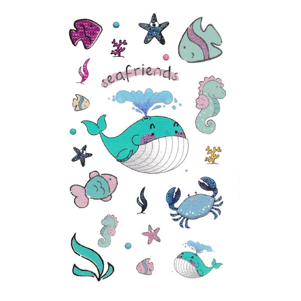 Faux tatouage enfant animaux des océans avec baleine, hippocampe, crabe et poissons - Tatouage temporaire enfant en décalcomanie à coller Skindesigned.